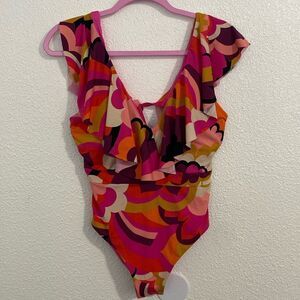 NWT- Trina Turk-pink and orange wave print ruffle neck one piece swimsuit-Size 8